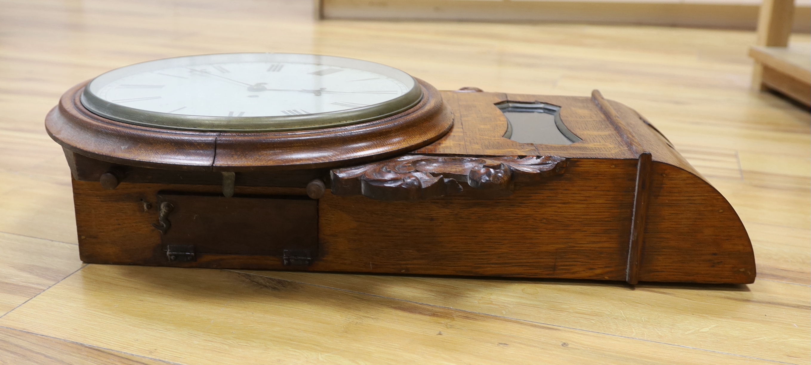 A 19th century oak eight day drop dial wall clock, with twin fusee movement, 65cm